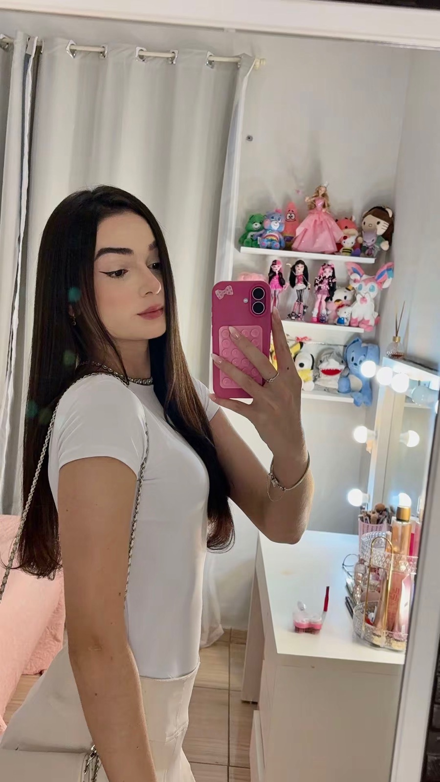 Sarah wearing white in a mirror portrait